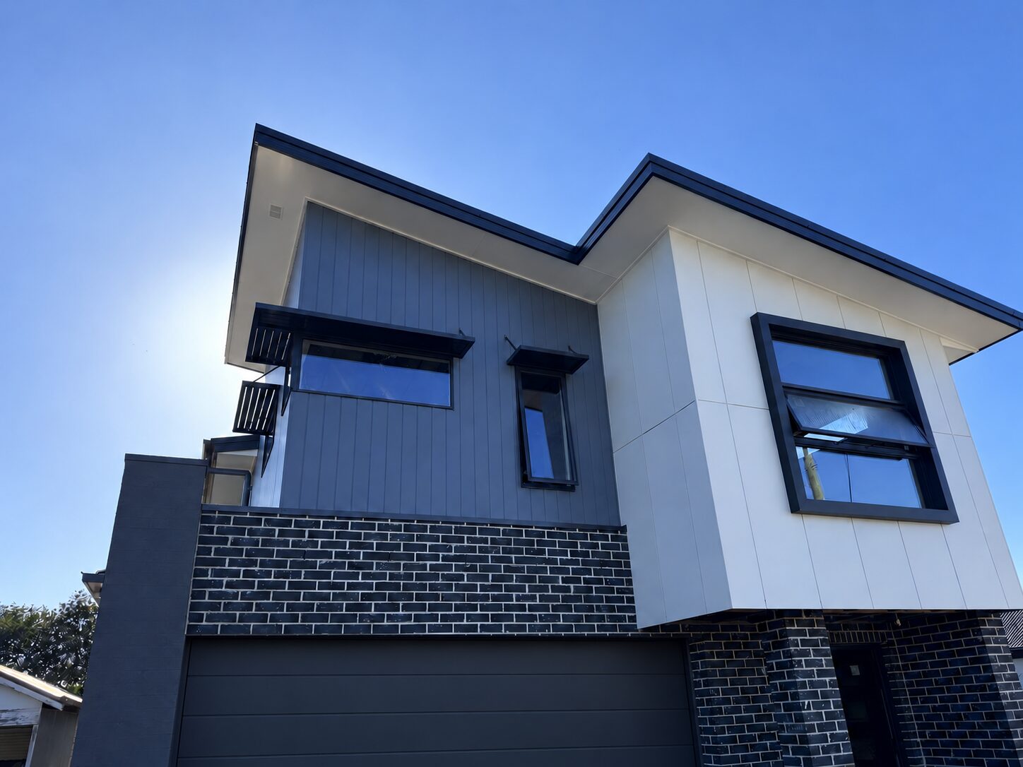 Cladding and black windows
